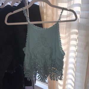 Blue embellished crop top from Pacsun.